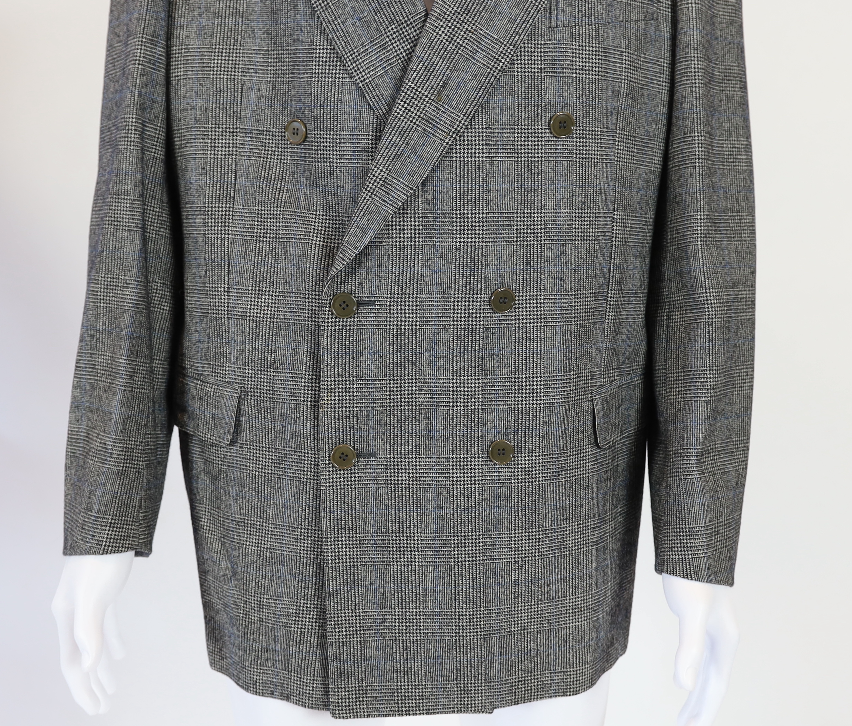 A Yves Saint Laurent rive gauche gentlemen's Prince of Wales check double breasted wool suit, approx size 42